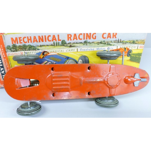 638 - A Mettoy No. 3084 tinplate mechanical racing car, boxed, box restored