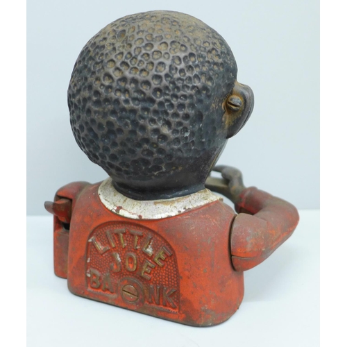 651 - A cast iron Little Joe money bank