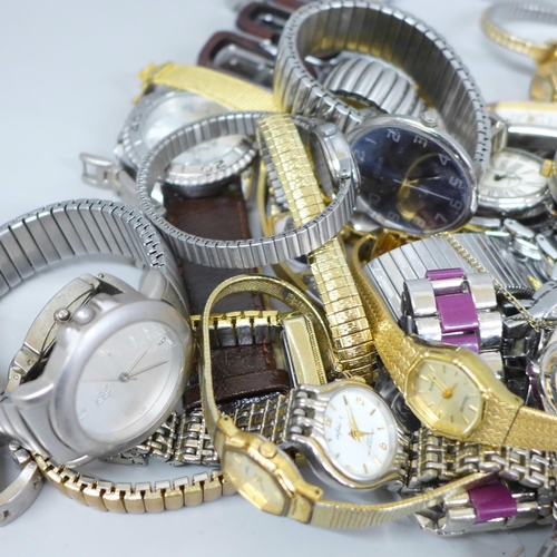 652 - Approximately fifty lady's and gentleman's wristwatches