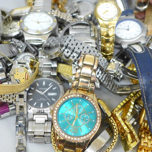 652 - Approximately fifty lady's and gentleman's wristwatches