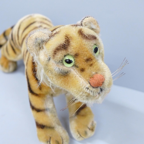 654 - A Steiff tiger cub, lacking button/label