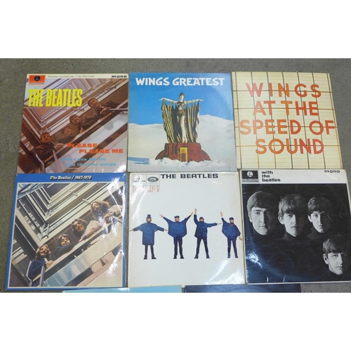 665 - Five The Beatles LP records including Sgt Peppers 'wide spine' and four Wings LP records