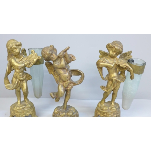 705 - Three small cherub posy holders, one glass holder missing