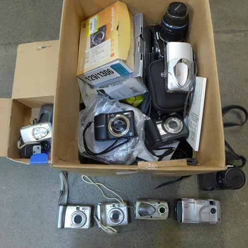 740 - A large box of digital cameras