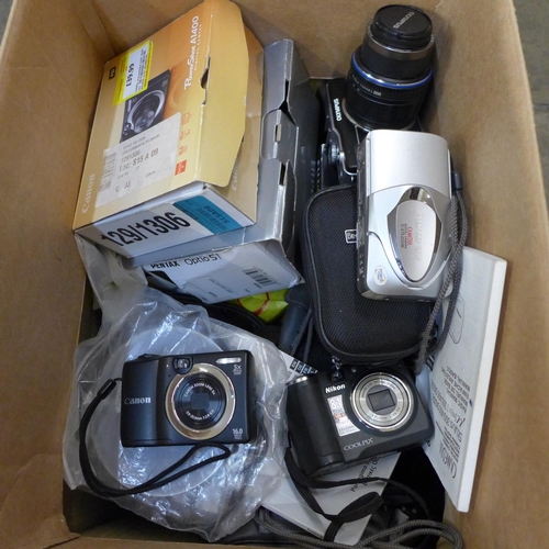 740 - A large box of digital cameras