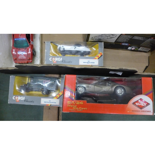 791 - A collection of boxed Burago, Corgi, Prestige and other model vehicles