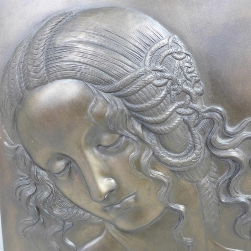 818 - A relief moulded resin Art Nouveau style plaque