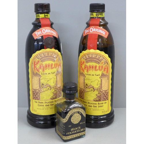 831 - Two bottles of Kahlua coffee liqueur and a small bottle of Black Mountain liqueur