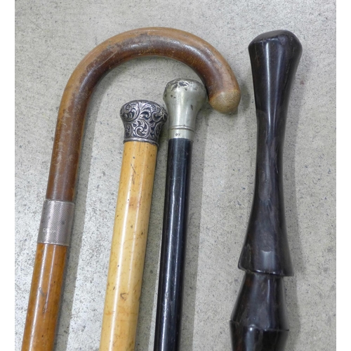 835 - Two canes, one with silver top and a walking stick with silver collar