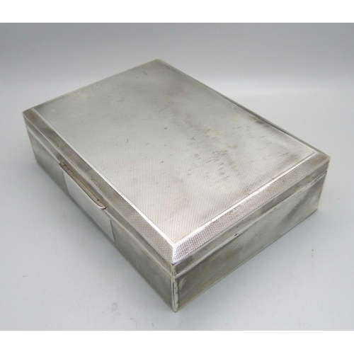 897 - A silver cigarette box, 16.5cm wide