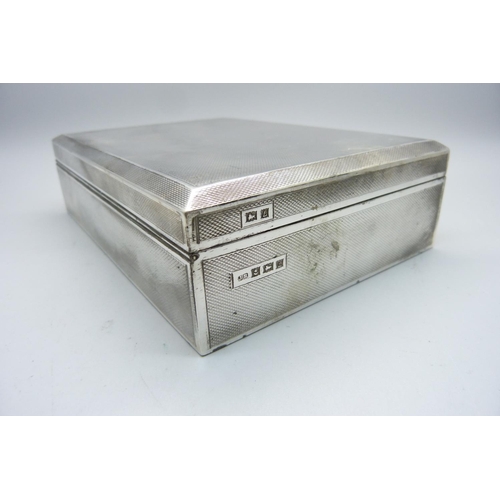 897 - A silver cigarette box, 16.5cm wide