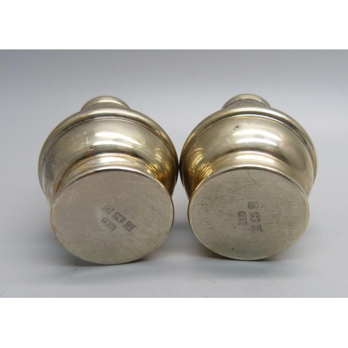 898 - A silver salt and pepper pair, 74g