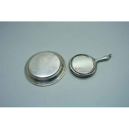 909 - A small silver mirror, Birmingham 1922, and a small silver dish/tray, London 1938, (dish 28g)