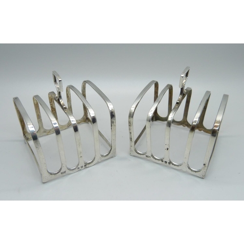 913 - A pair of silver toast racks, Birmingham 1928, Mappin & Webb, 121g