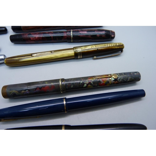 916 - Thirteen fountain pens, some with gold nibs including two Parker Duofold and Slimfold Waterman's 513... 