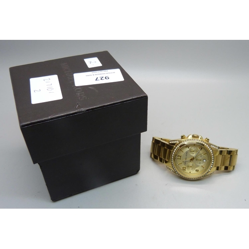 927 - A Michael Kors wristwatch, boxed, case back loose