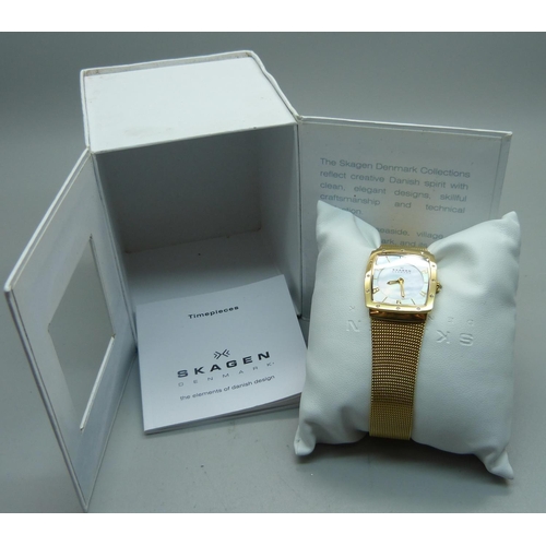 928 - A lady's Skagen wristwatch with mother of pearl dial, boxed