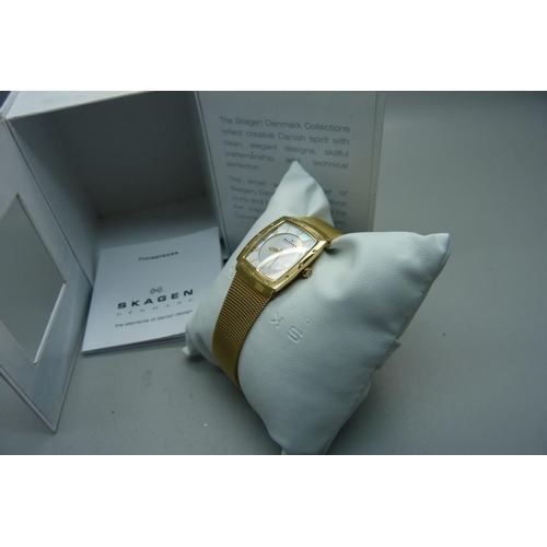 928 - A lady's Skagen wristwatch with mother of pearl dial, boxed