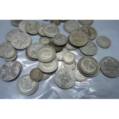 943 - A collection of silver coins, 384g