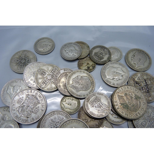 943 - A collection of silver coins, 384g