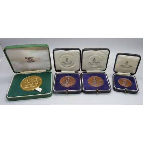 953 - Three Royal Military Tournament medals, R.N.T.E. Shotley, cased, and a Royal Mint HM Tower of London... 