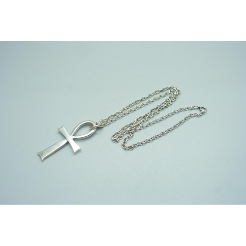 967 - A silver Coptic Ankh cross pendant on a white chain, 27g