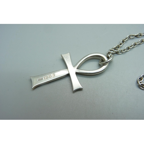 967 - A silver Coptic Ankh cross pendant on a white chain, 27g