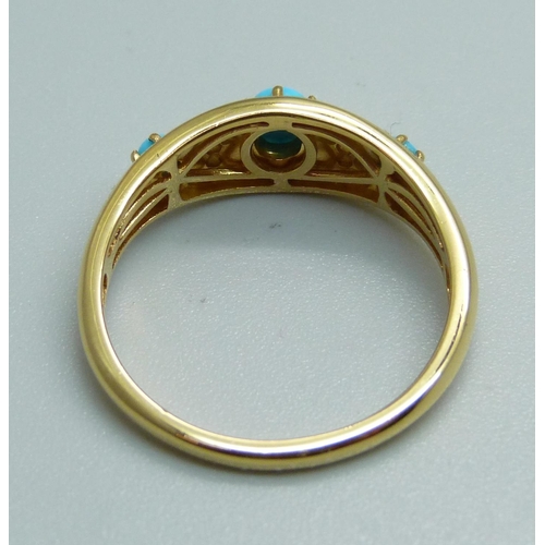 975 - A silver gilt and turquoise ring, U