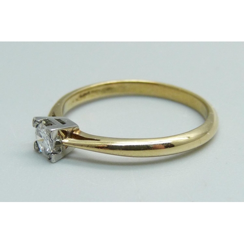 982 - An 18ct gold and diamond solitaire ring, 2.3g, M