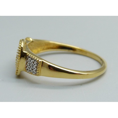 983 - A silver gilt diamond set buckle ring, S