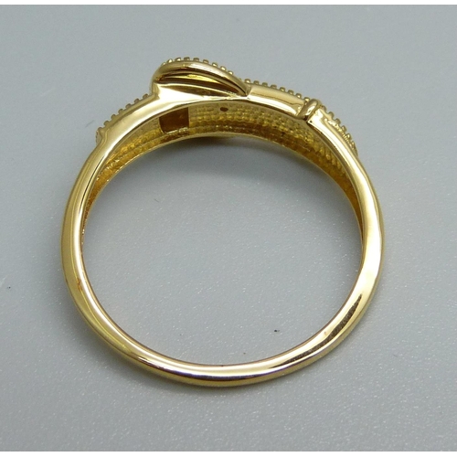 983 - A silver gilt diamond set buckle ring, S