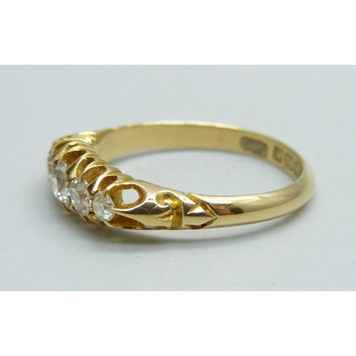 988 - An 18ct gold five stone diamond ring, Birmingham 1909, 3g, M