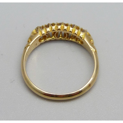 988 - An 18ct gold five stone diamond ring, Birmingham 1909, 3g, M