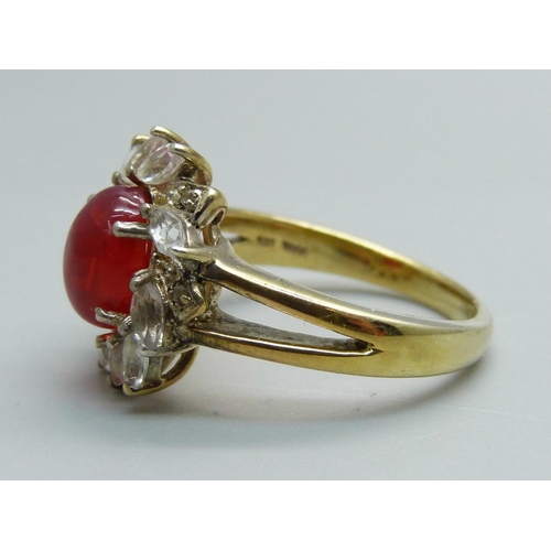 991 - A silver gilt, red/orange cabochon and white stone ring, S