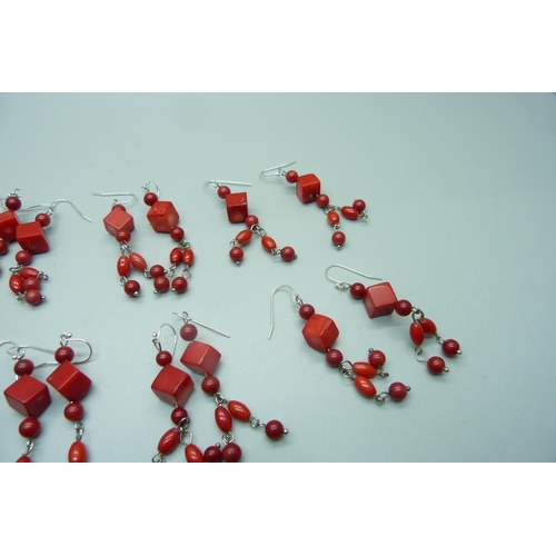 998 - Nine pairs of coral earrings with silver hooks