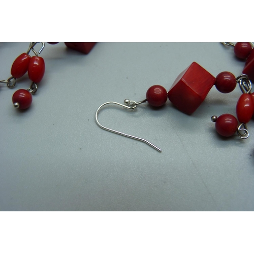 998 - Nine pairs of coral earrings with silver hooks