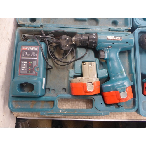 2130 - Makita drill, 2 batteries and charger 8391D, Makita drill, 2 batteries and charger 6228D