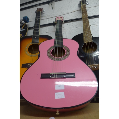 2229 - Three acoustic guitars; martin Smith pink W-560-PNK, Chantry 3369 and Swift black guitar