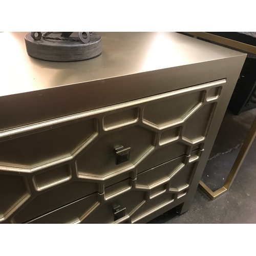 1404 - A champagne painted geometric low sideboard