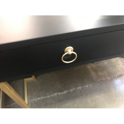 1407 - A black two drawer console table with gold legs