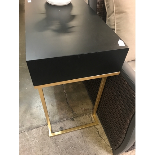 1407 - A black two drawer console table with gold legs