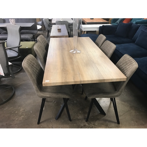 1441 - A Kamala dining table and six Finwick chairs