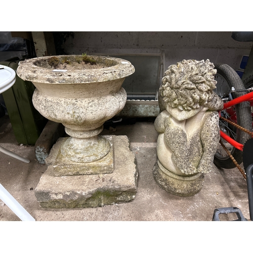 2435 - 2 Garden ornaments (cherub and plant tub)