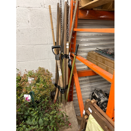 2434 - 2 Bundles of garden tools inc. shovels, picks, hoes, edge cutters, etc.