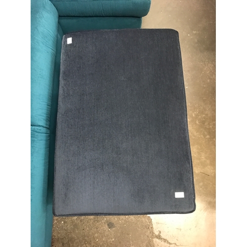 1492 - A blue upholstered footstool