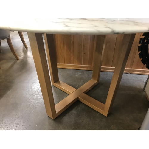 1505 - An oak effect and marble circular dining table  * This lot is subject to VAT