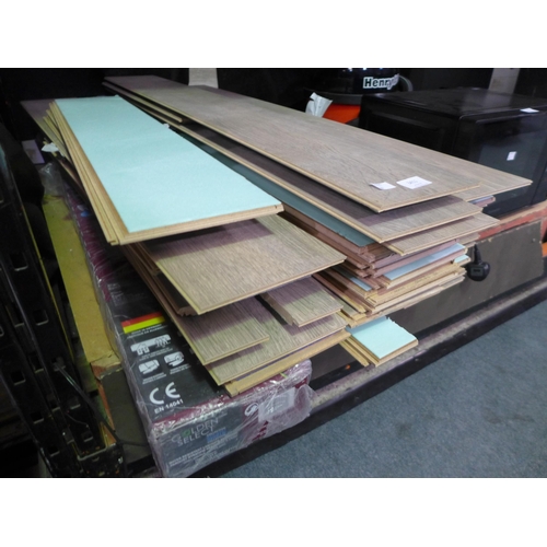 3411 - One pack of Grey Walnut and a Large Quantity of Hartford Oak Laminate Flooring (289-395,398) * This ... 