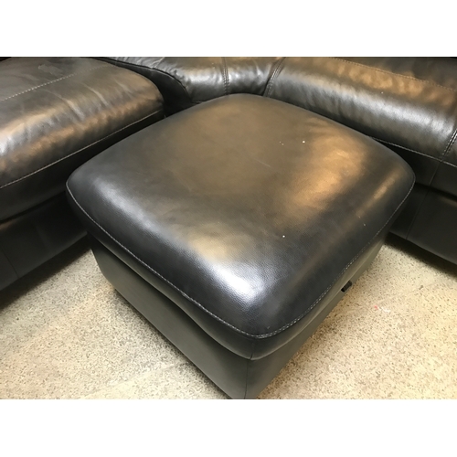 1535 - A black leather corner sofa