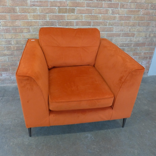 1302 - A tangerine velvet pinched back armchair (H=90cm x W=103cm x D=96cm)