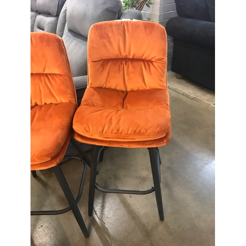 1306 - A pair of Enderson orange velvet bar stools